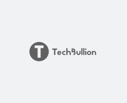 Logo featuring a gray circle with a white T inside, followed by the word TechBullion in gray text. The subtle background evokes the expansive feel of a Savanna, adding an element of wild innovation to the design.