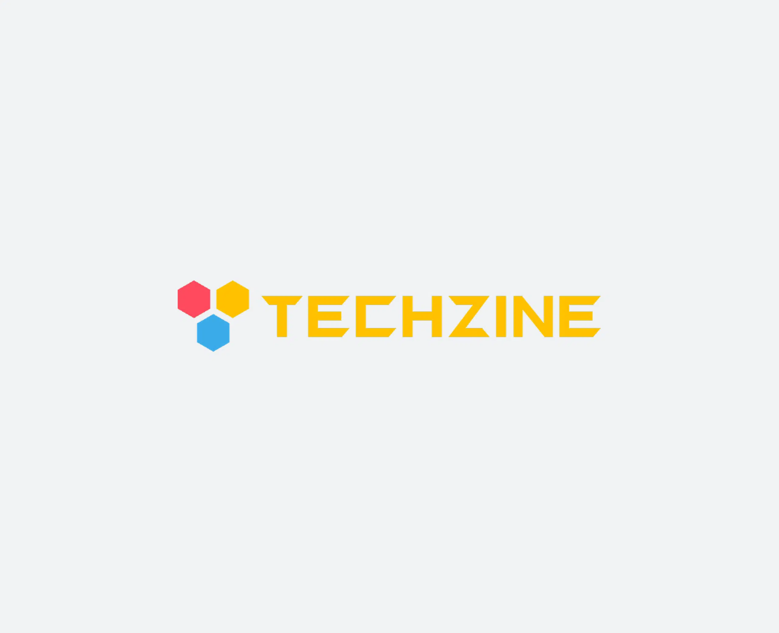 The image shows the Techzine logo with the word TECHZINE in yellow uppercase letters. Above the text, there are three hexagons in red, orange, and blue, arranged in a triangular formation. The background is light gray.