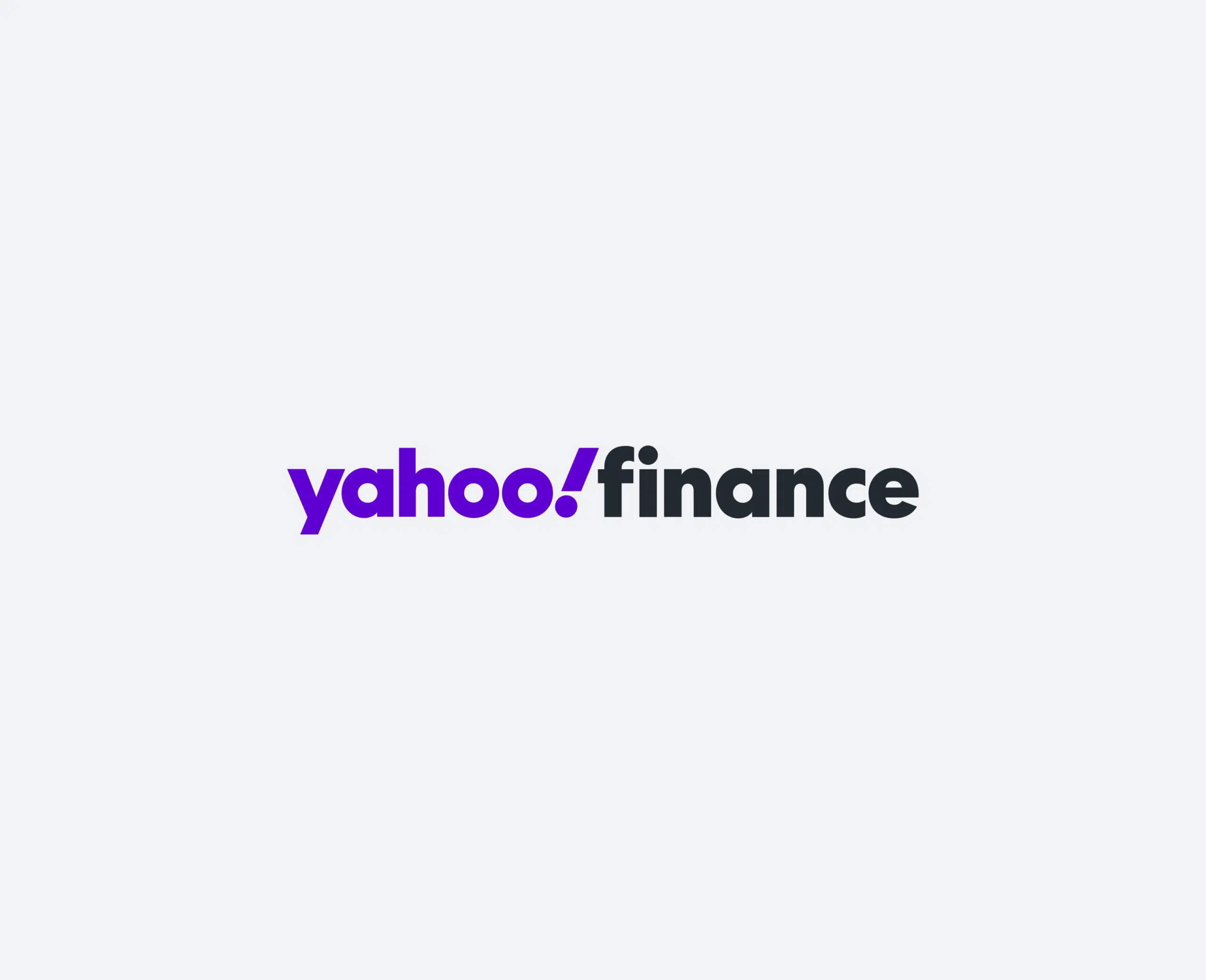 Logo of Yahoo Finance with yahoo! in bold purple text and finance in black text on a light gray background.